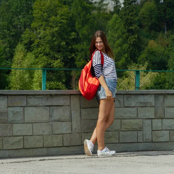 Young beautiful girl with backpack — Stock Photo, Image