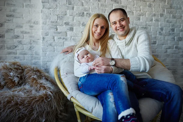 Happy father and mother with baby — Stock Photo, Image