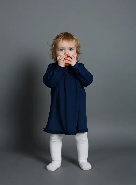 Little girl eating an apple — Stock Photo, Image