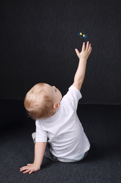 little boy playing with bubble