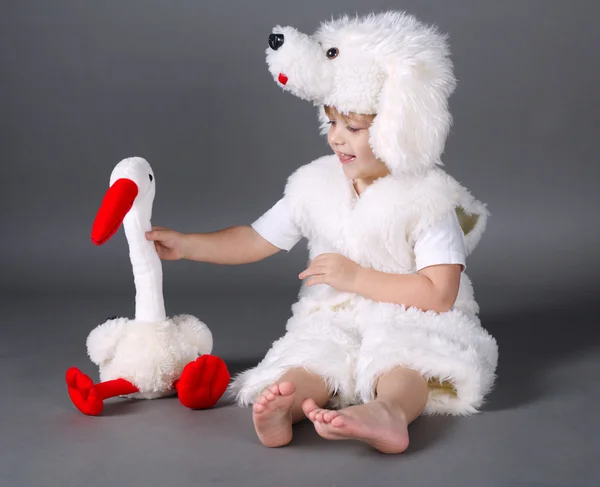 Niño pequeño con traje de perro —  Fotos de Stock