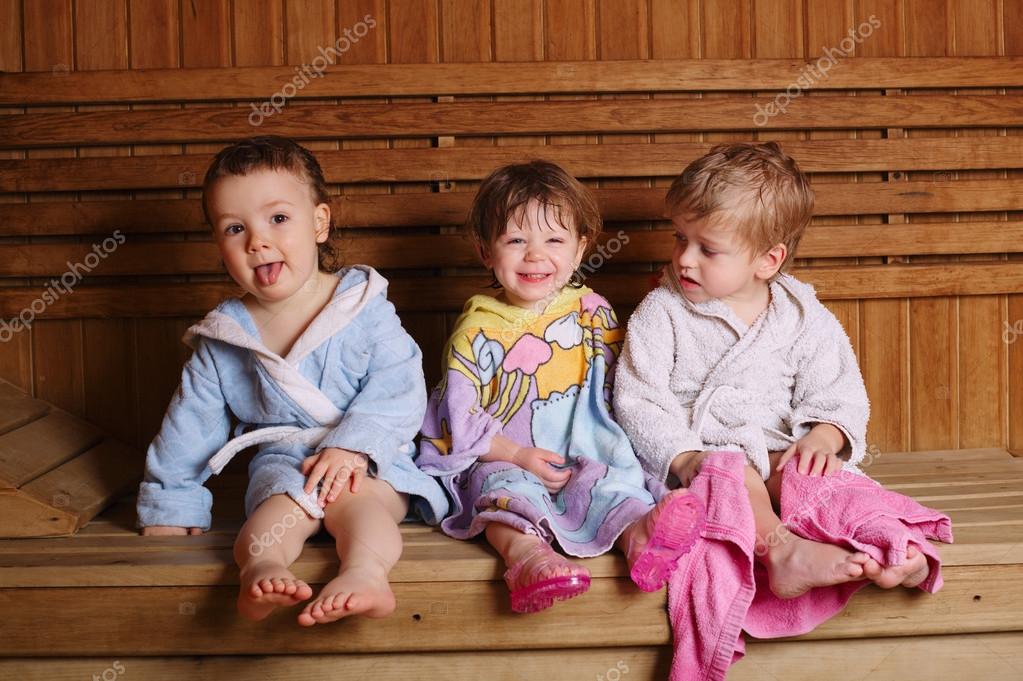 Three funny children in sauna Stock Photo by ©ababaka 121825640