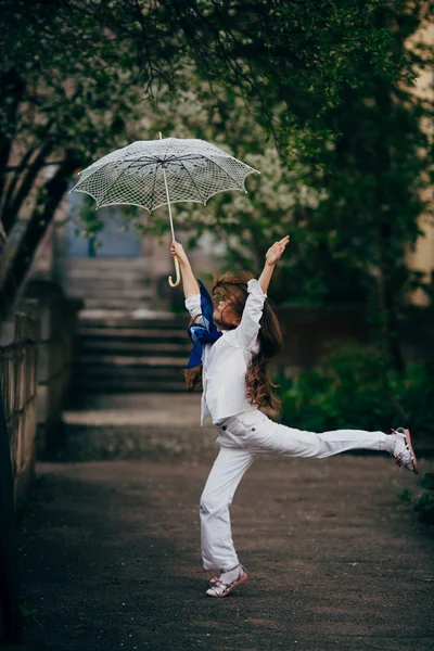 Little girl dancing with lace ambrella — Stock Photo, Image