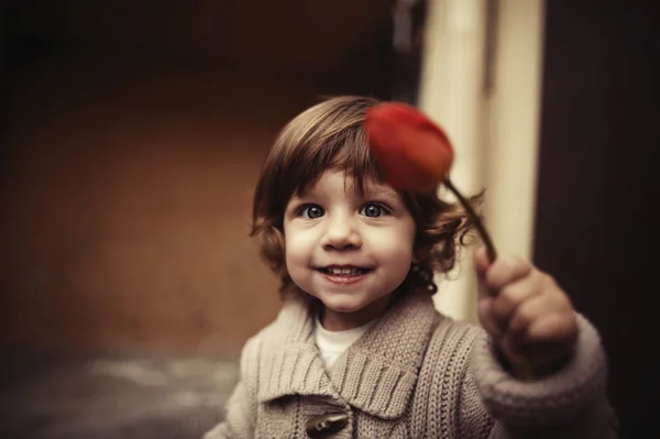 Cute girl with flower — Stock Photo, Image