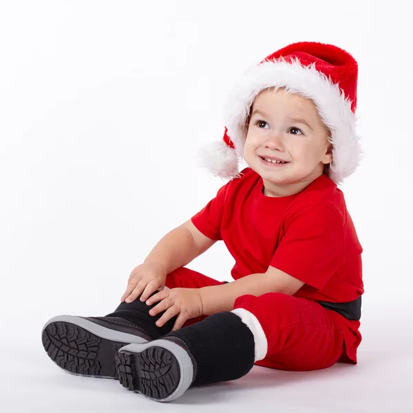 Petit garçon mignon avec chapeau de Père Noël — Photo