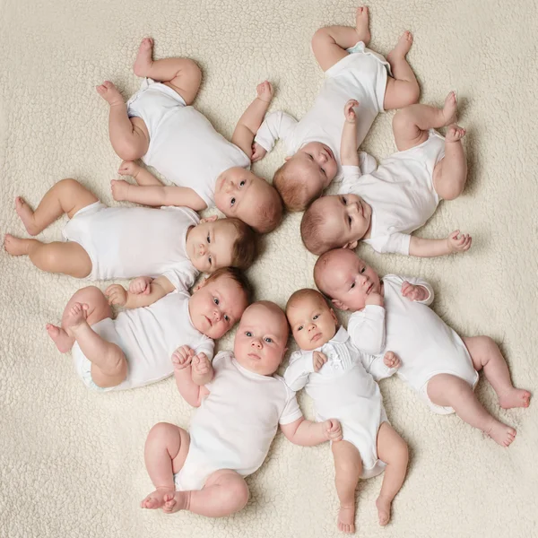 Babies on a light background — Stock Photo, Image