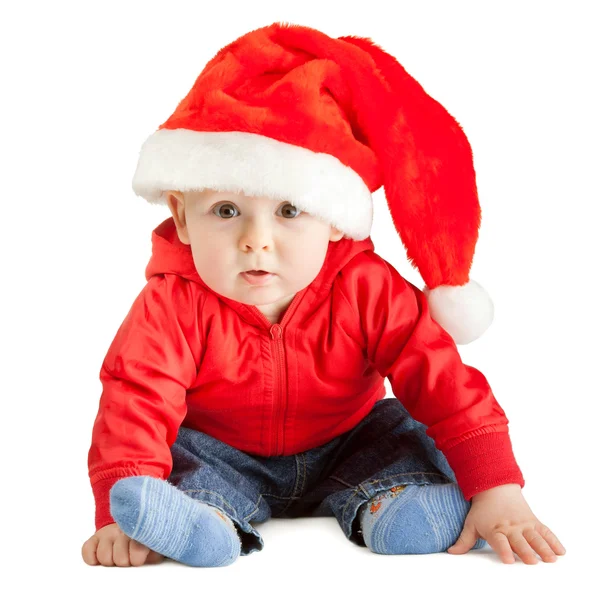 Liten glad pojke i santa hatt — Stockfoto