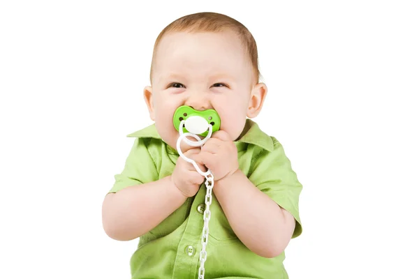 Маленький счастливый мальчик с соском — стоковое фото