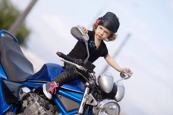 Little biker on road with motorcycle — Stock Photo, Image