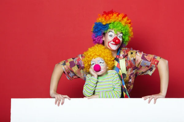 Grandi e piccoli buffi clown foto — Foto Stock