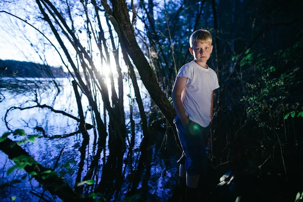 Little boy on swamp — Stock Photo, Image