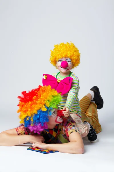 Grandi e piccoli buffi clown foto — Foto Stock