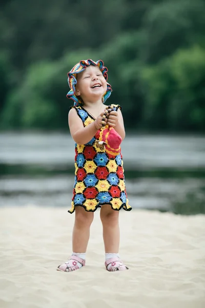 Little girl with bright colorful dress — Stock Photo, Image