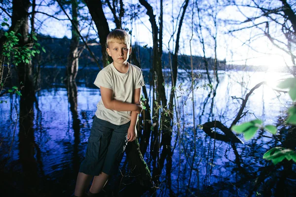 Little boy on swamp — Stock Photo, Image