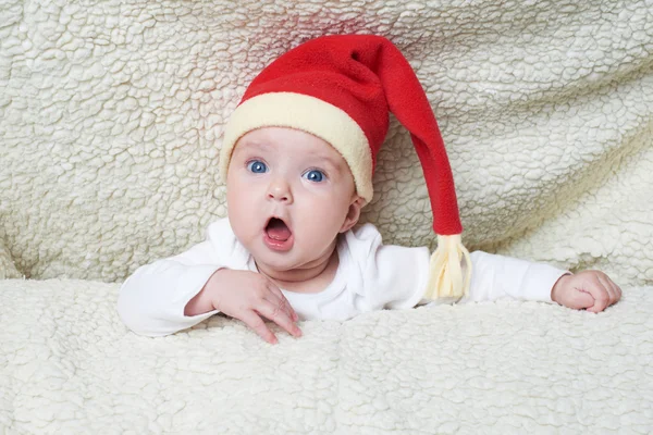 Cute baby in Santa hat — Stock Photo, Image