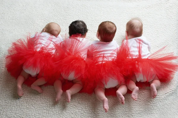 Babes in skirts ballerinas rear view — Stock Photo, Image