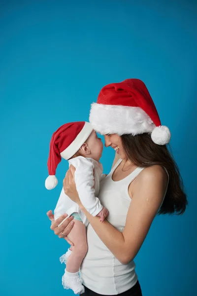 Jovem mãe com seu bebê doce — Fotografia de Stock