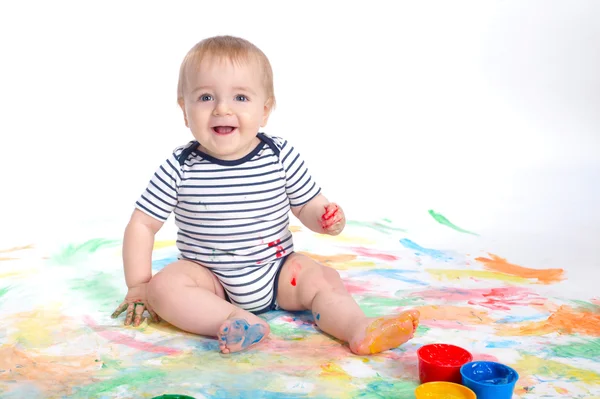 Vicces kis fiú ujját festékek — Stock Fotó