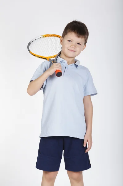 Raket ve topları ile küçük çocuk — Stok fotoğraf