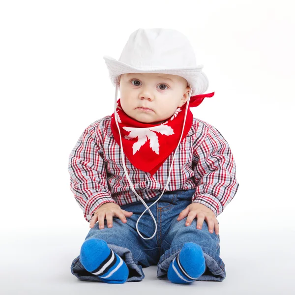 Kleiner lustiger Cowboy auf weißem Hintergrund — Stockfoto
