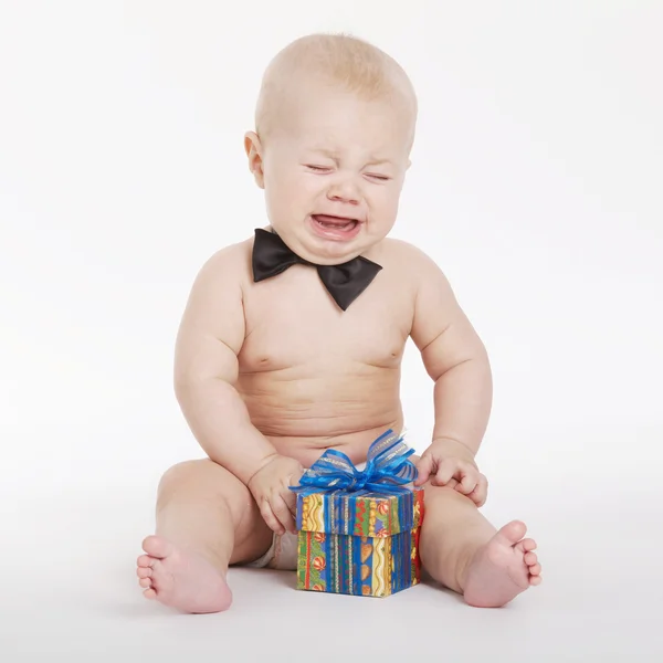 Little funny boy with gift — Stock Photo, Image