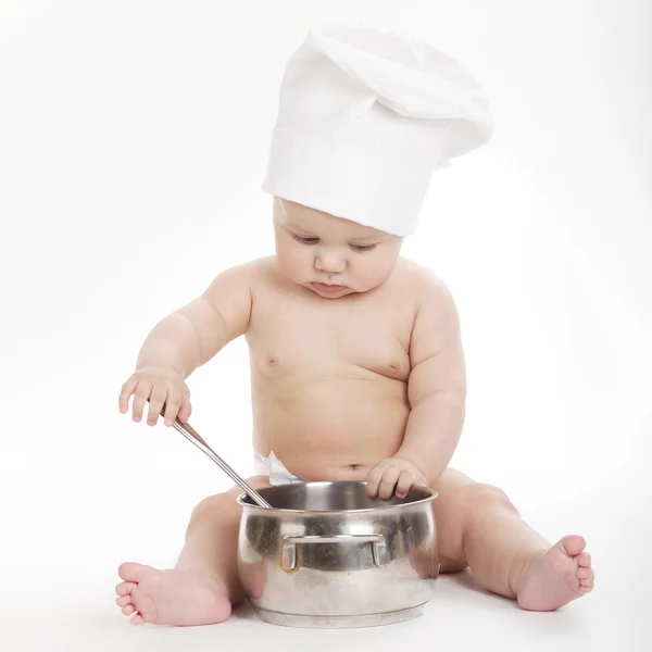 Pouco bonito cozinheiro no fundo branco — Fotografia de Stock