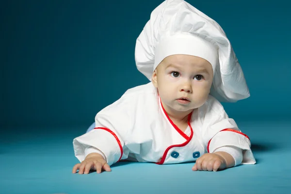Mignon petit bébé avec chapeau de chef — Photo