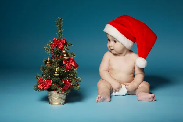 Boy in diapers with hat of Santa Claus — Stock Photo, Image