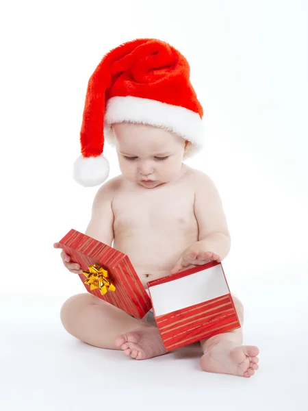 圣诞老人的帽子，在白色的可爱男孩 — 图库照片