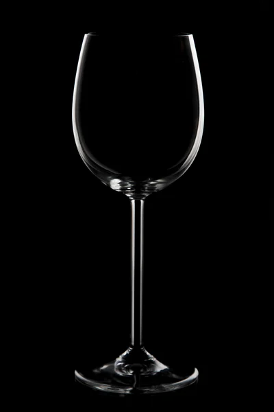 Wine glass on black background and rim lighting — Stock Photo, Image