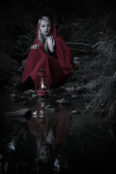 Attractive Woman Dressed Little Red Riding Hood Cross Stream Dark Stock Picture