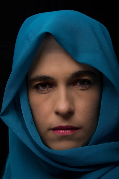 Middle Eastern woman portrait looking sad with blue hijab artist — Stock Photo, Image