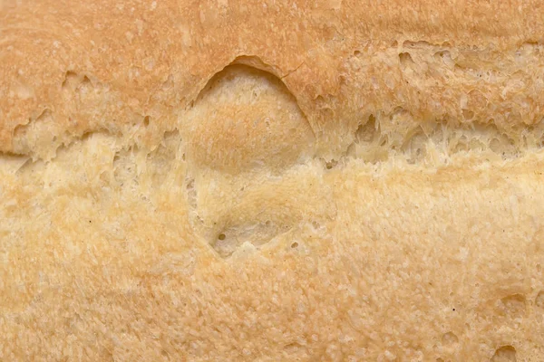 Bir Ekmek Kabuğunun Gözenekli Dokusu Arka Plan — Stok fotoğraf