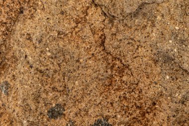 Kışın kardaki taş dokusu, arka plan soyut..