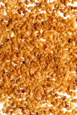 Arkaplan olarak kızarmış susam tohumları.