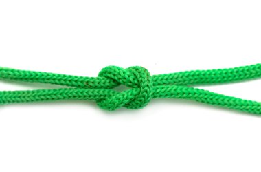 Beyaz arkaplanda yeşil ip yakın plan