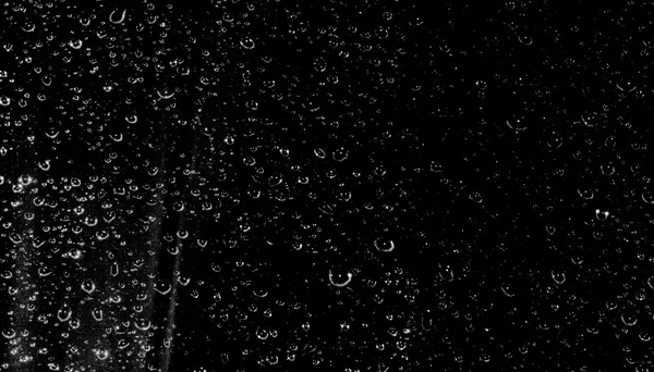 Drops of water on a black background — Stock Photo, Image