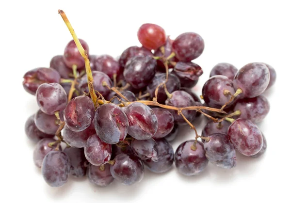 Uvas sujas em um branco — Fotografia de Stock