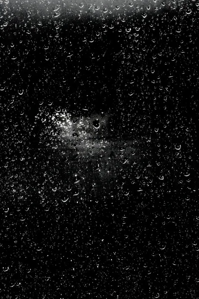 Drops of water on a black background — Stock Photo, Image