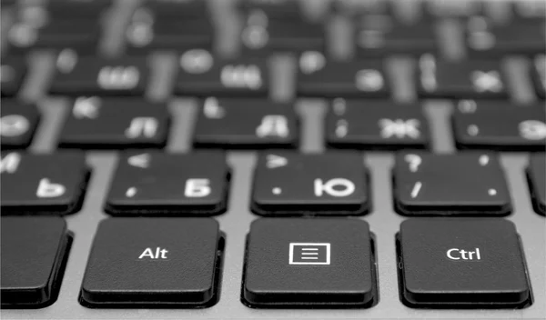 Teclado preto com letras brancas — Fotografia de Stock