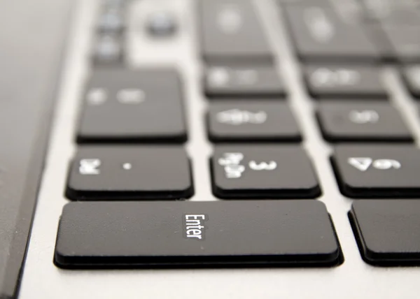Černá klávesnice s bílými písmeny — Stock fotografie