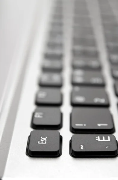 Teclado preto com letras brancas — Fotografia de Stock