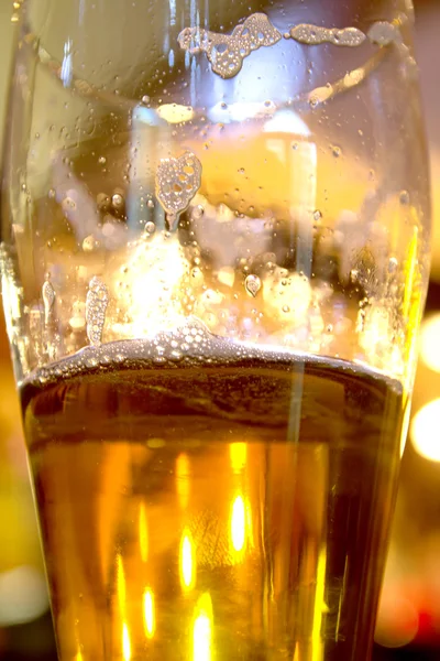 Beer glass in bar — Stock Photo, Image