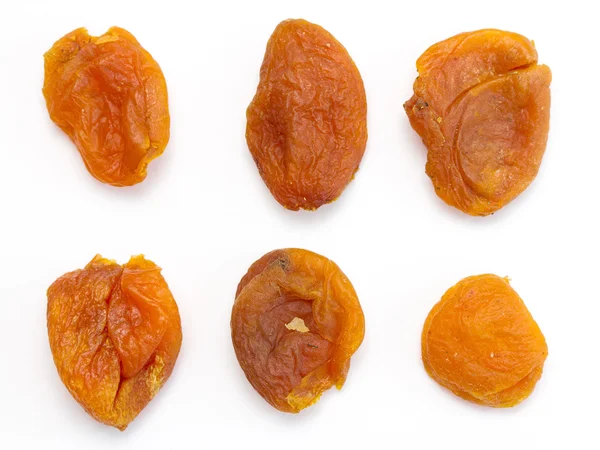 Apricots dried on a white — Stock Photo, Image