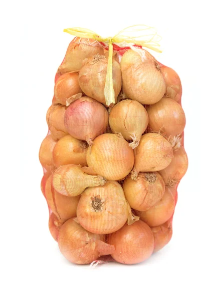 Onions in  bag closeup — Stock Photo, Image