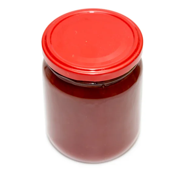 Glass jar with tomato juice — Stock Photo, Image