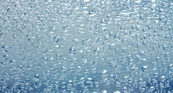 Gotas de lluvia en la ventana — Foto de Stock