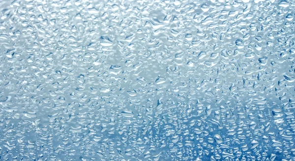 Gotas de lluvia en la ventana — Foto de Stock