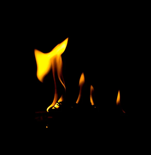 Llamas de fuego en negro — Foto de Stock