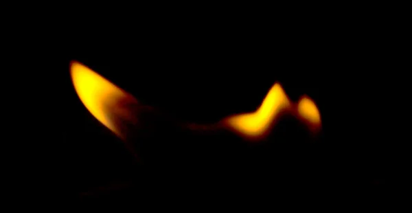 Płomienie ognia na czarnym — Zdjęcie stockowe